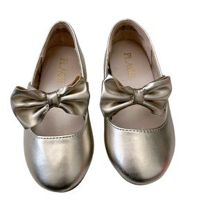 Gold bow dress shoes